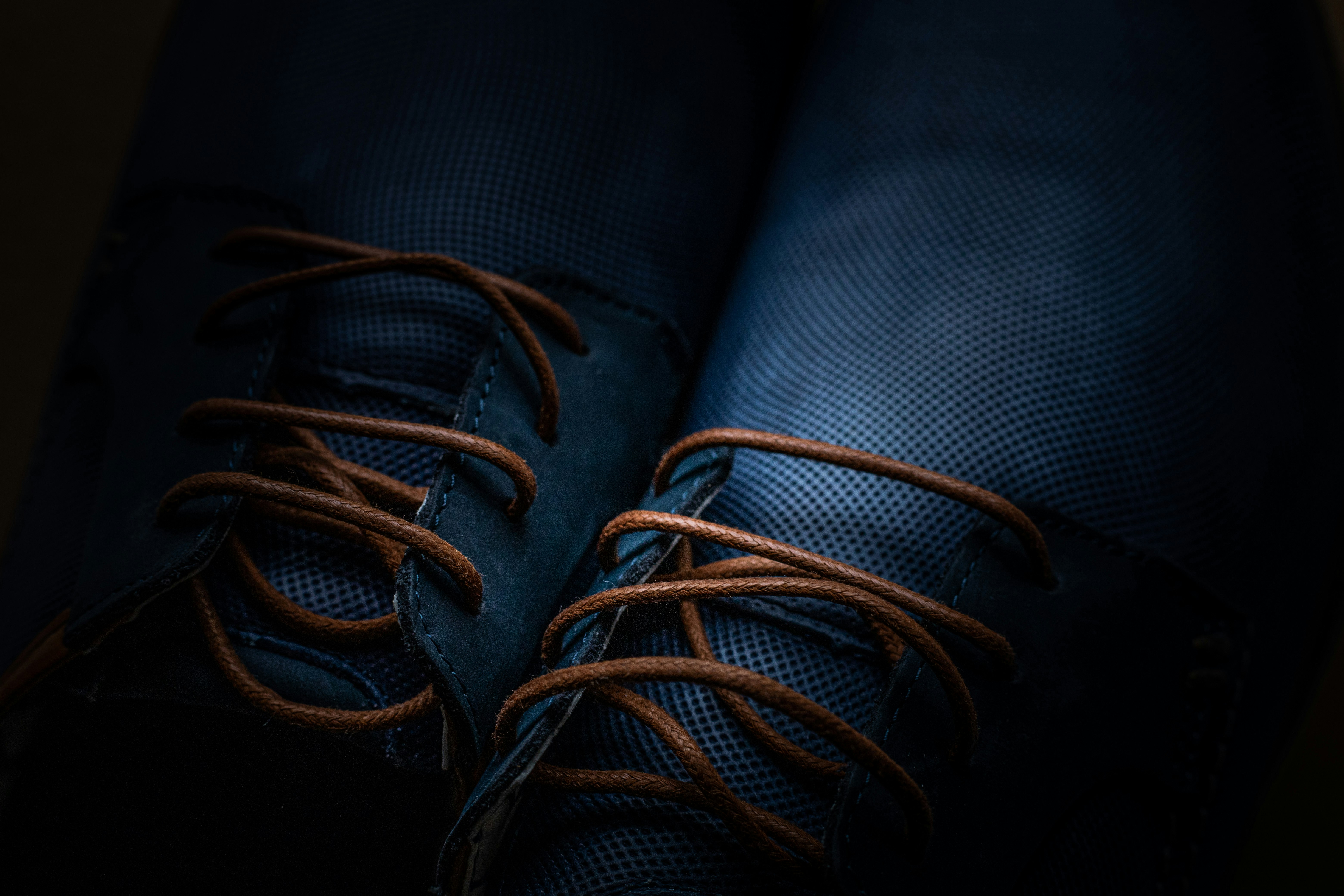 blue and brown rope on black textile